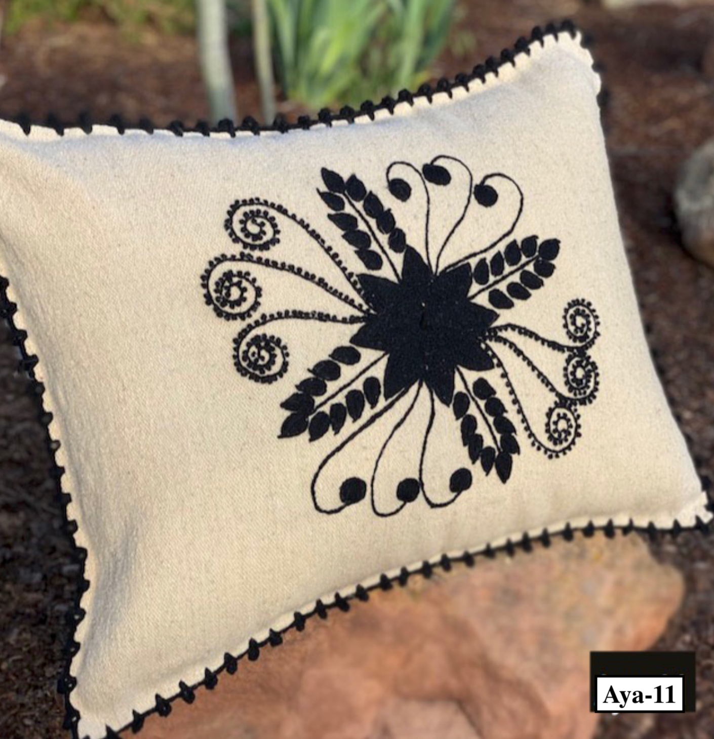 Embroidered wool pillows from Ayacucho, Peru