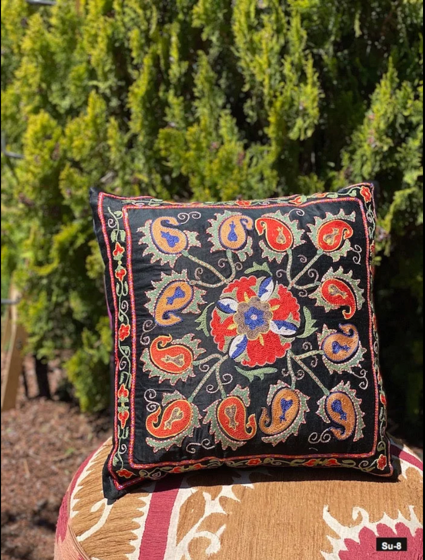 Hand-embroidered silk Suzani pillows from Uzbekistan