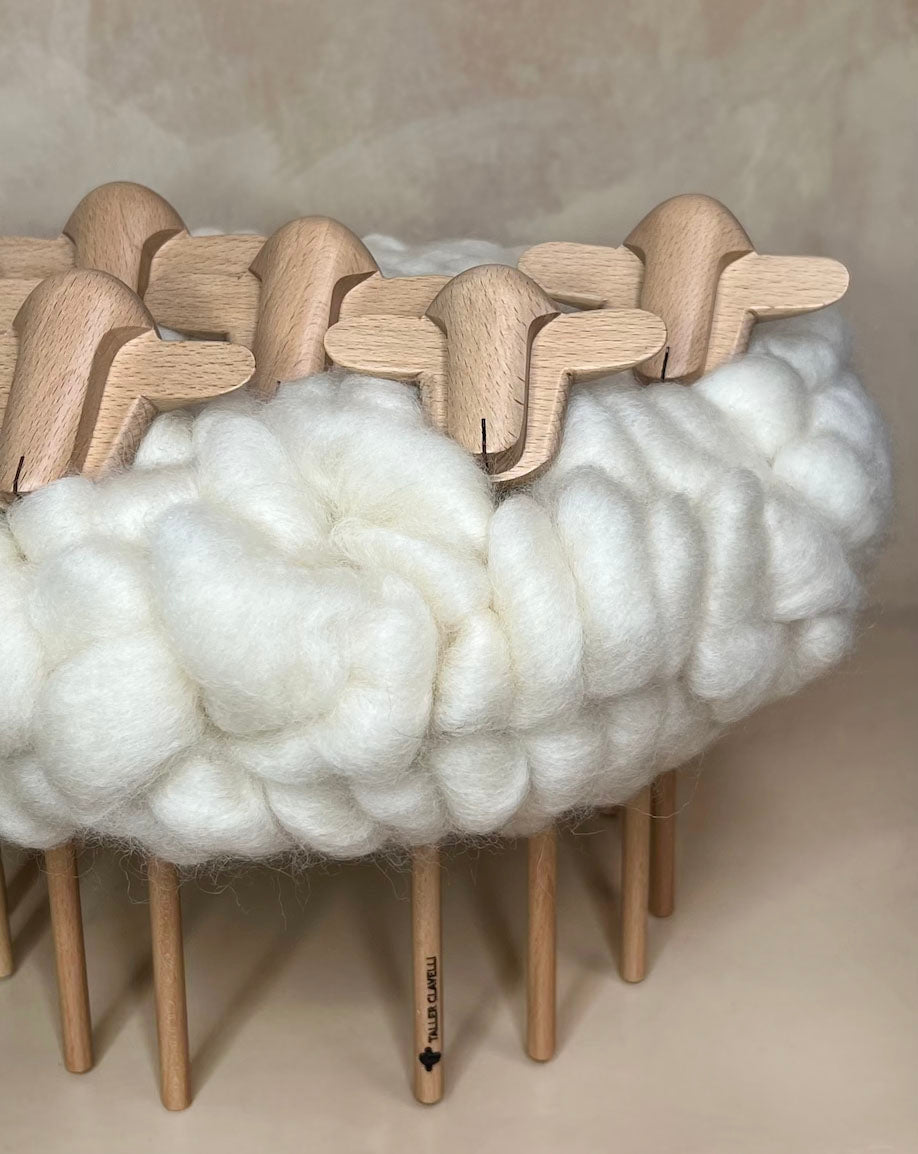 Flock of sheep with wool top handmade in Uruguay