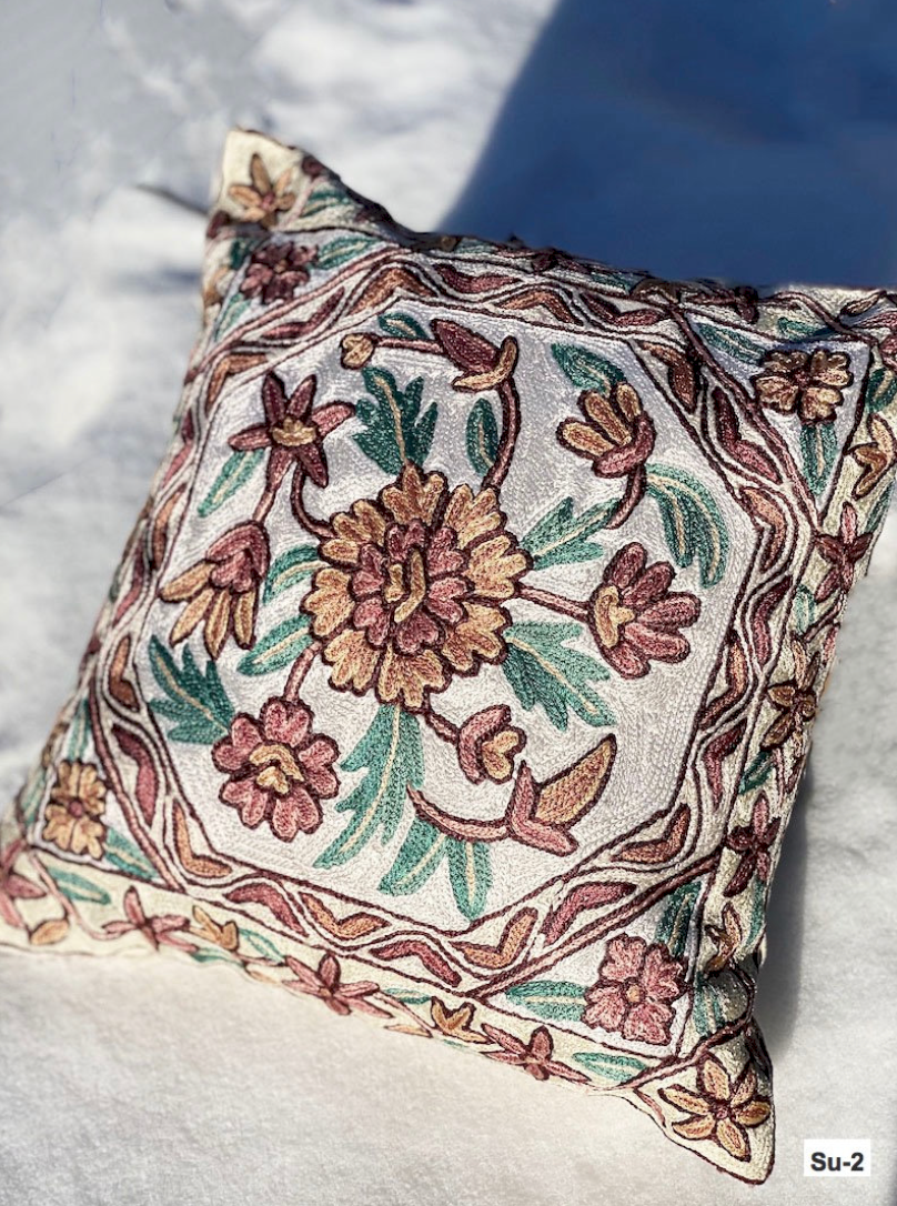 Hand-embroidered silk Suzani pillows from Uzbekistan